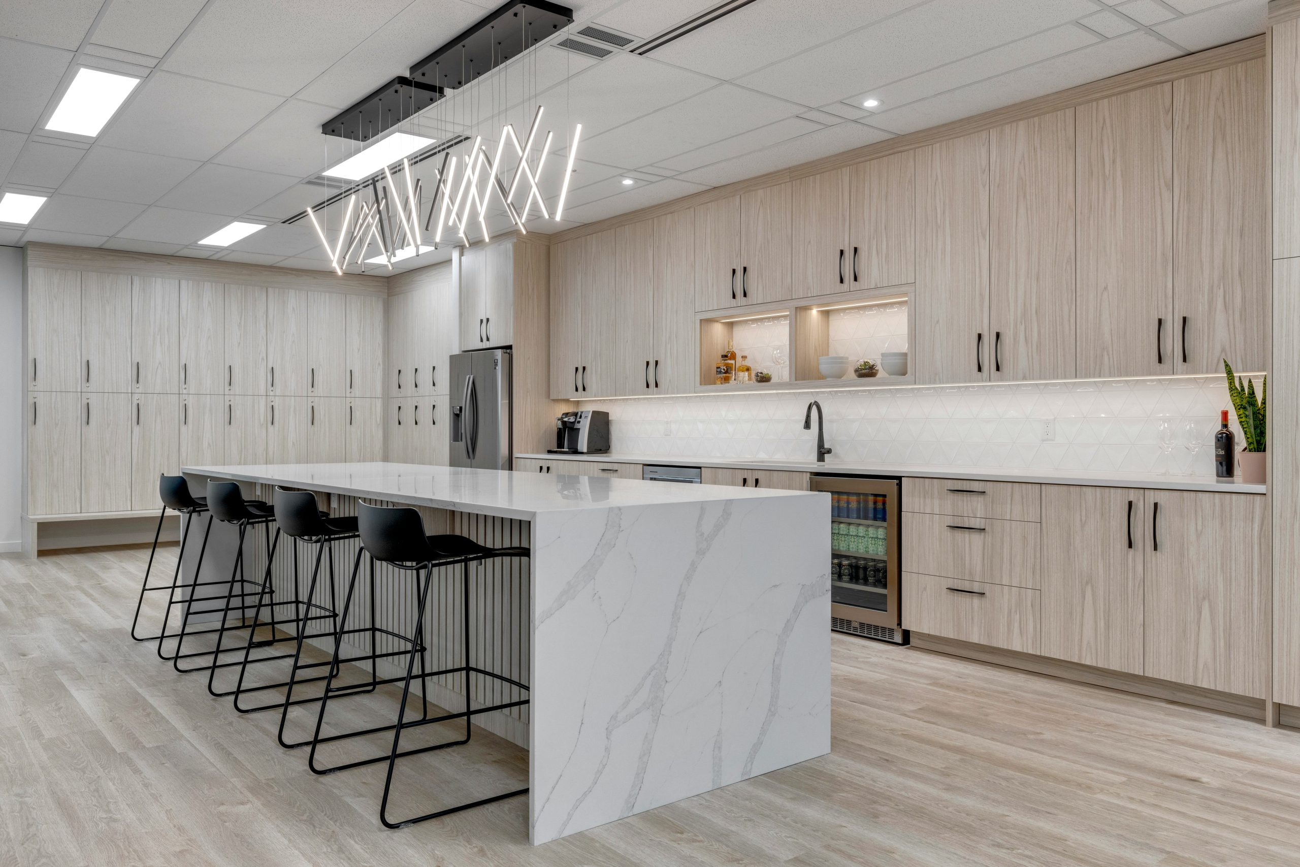 Contemporary white kitchen with bar seating